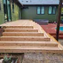 wood-deck-repair-cedar-park Wooden deck with pool creating a perfect relaxation spot