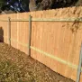 wood-fence-repair-cedar-park Wood fence with steel posts for enhanced strength and stability